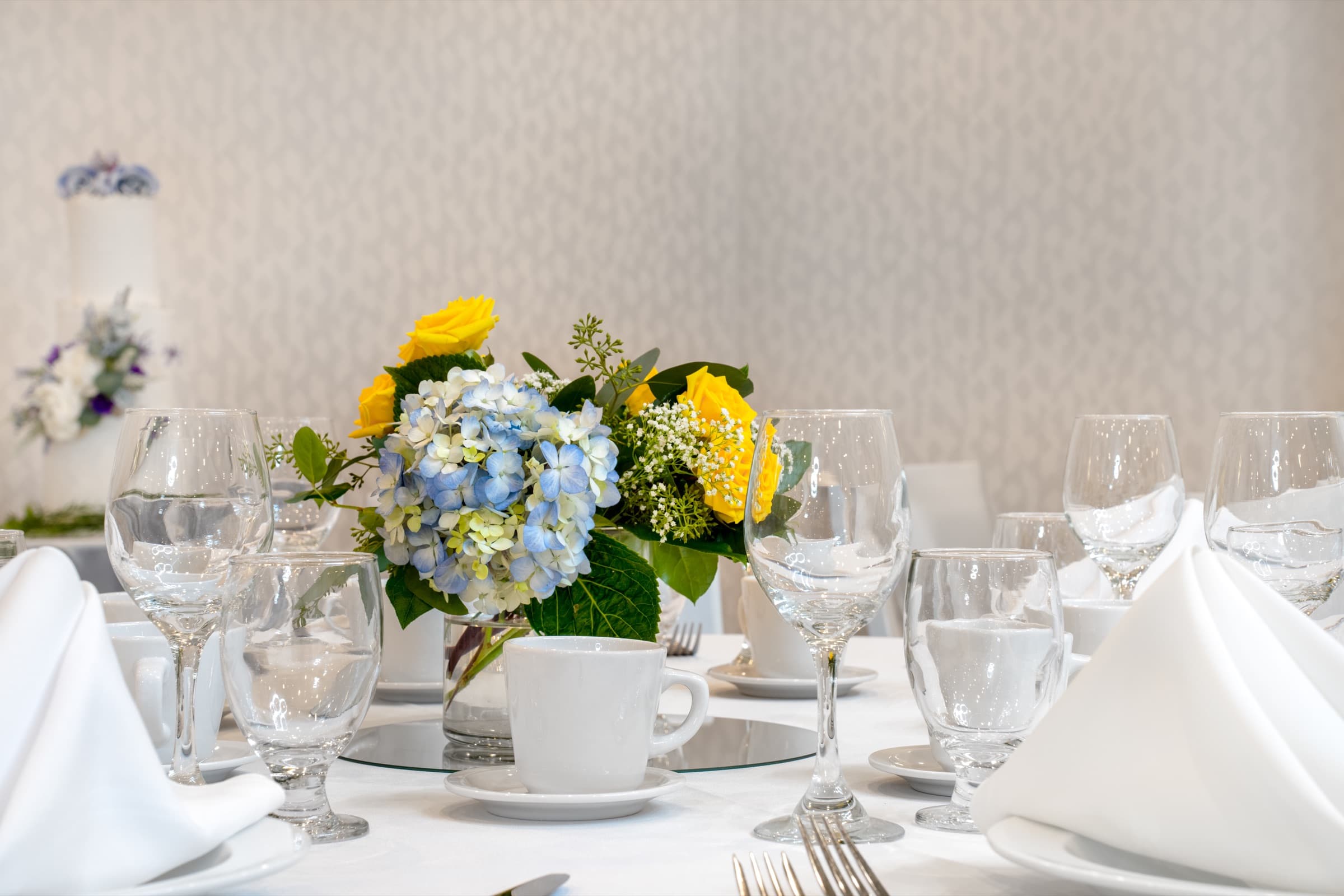 Floral centerpiece on a formal banquet table