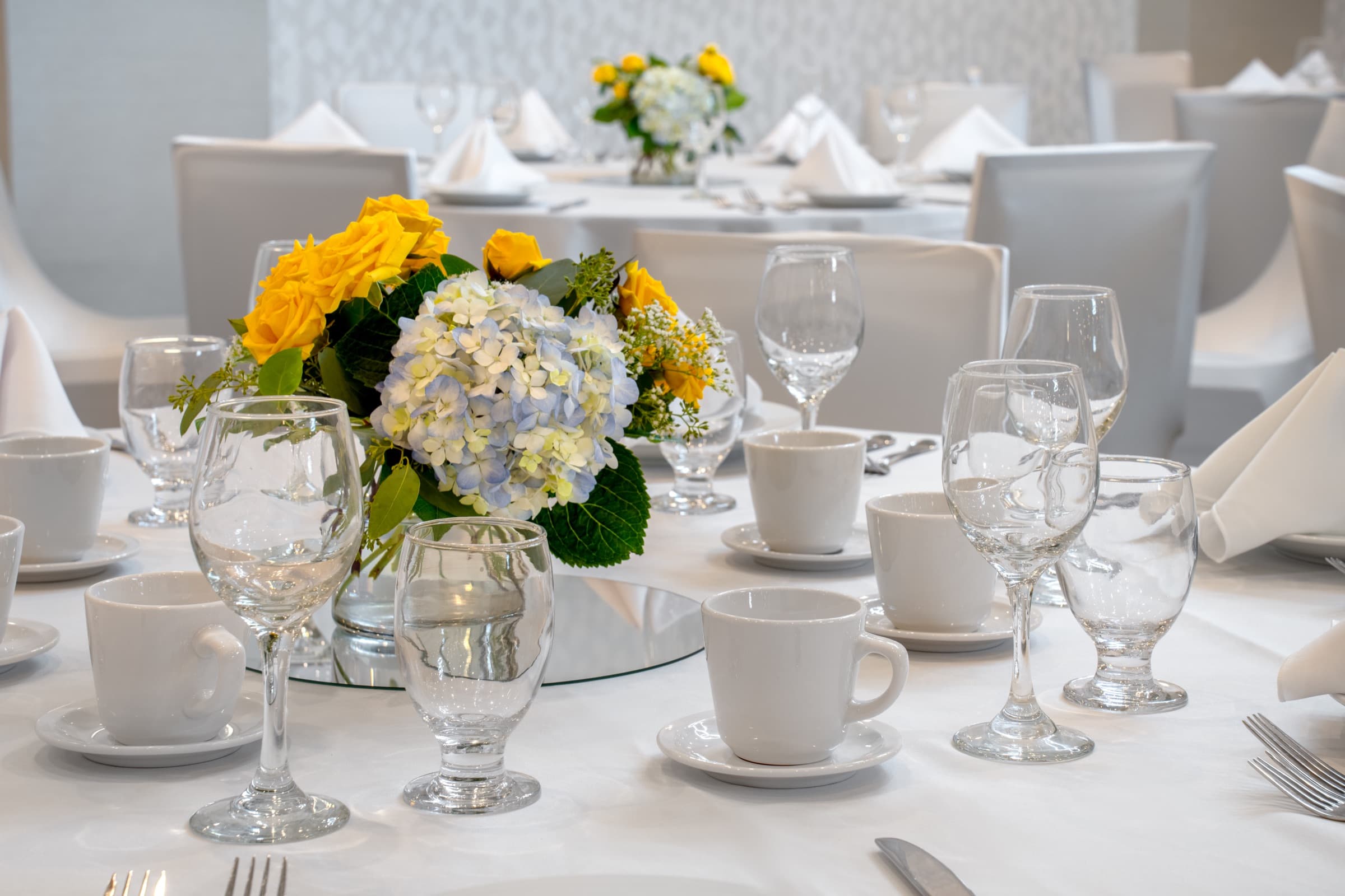 Formal tablescape with linens and florals