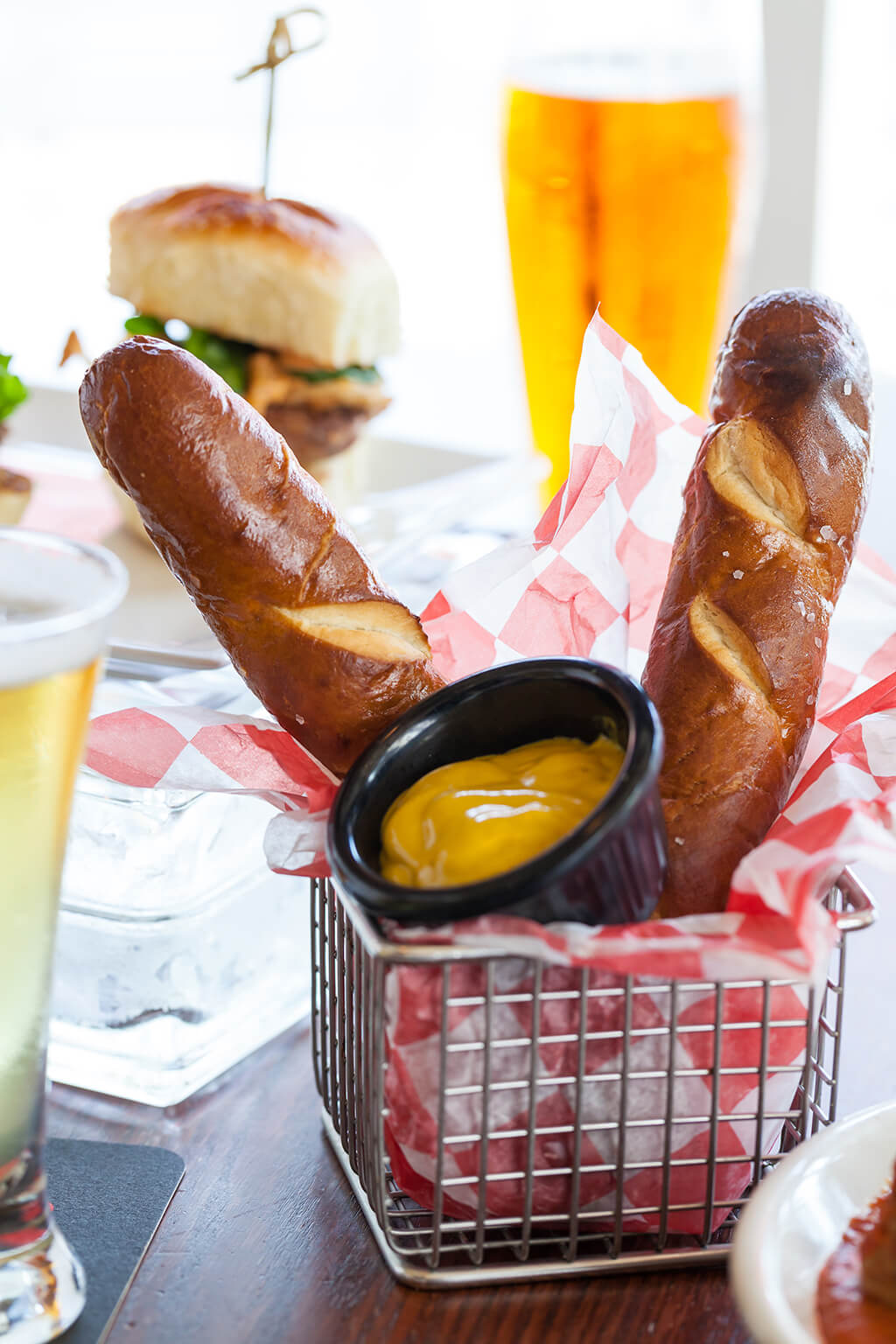 Bavarian pretzel with mustard and a beer